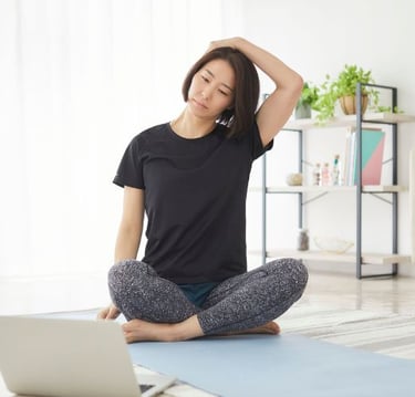woman doing a neck stretch