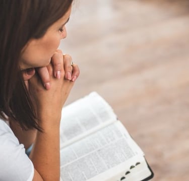 woman reading a bible