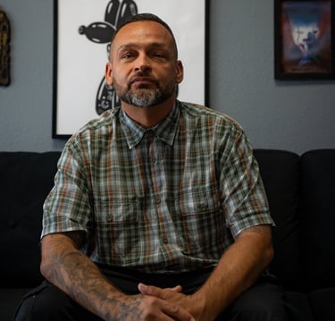 Tattoo artist Matt focused during a session at Aura Tattoo Studios, Lewisville’s top tattoo shop