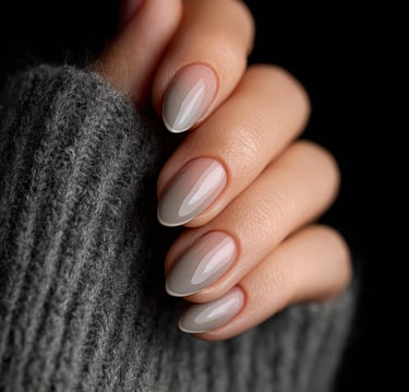 Neutral taupe almond nails with glossy minimalist finish