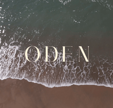 a beach picture with sand and sea