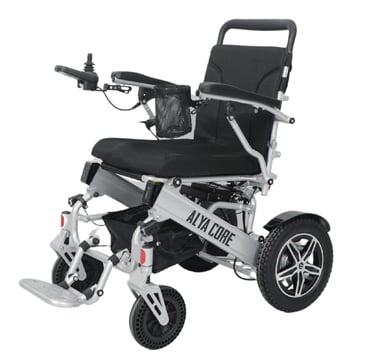 All-terrain electric wheelchair with wide rear tires and joystick