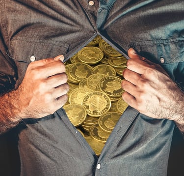 man with chest full of gold coins symbolizing how he is very wealthy and rich investor for gold ira