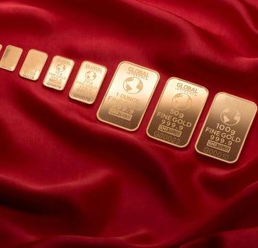 gold bars layed out in a row symbolizing blog post augusta precious metals, a gold ira company and why you should choose them