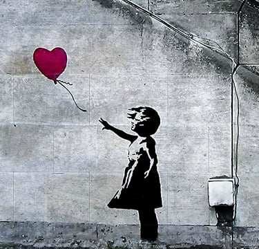 Banksy a girl with a red balloon in the air