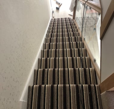 Striped carpet stairs