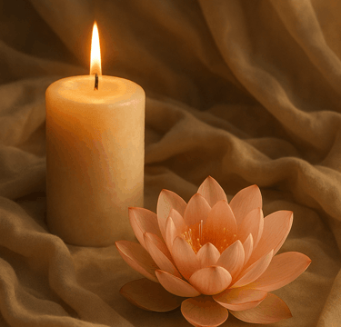 Peaceful meditation setup with candle and lotus flower representing tantra