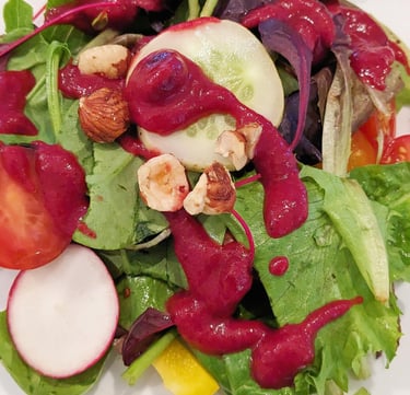Rainbow salad with heirloom cherry tomato & superfood berry dressing. Gluten-free dairy-free dinner
