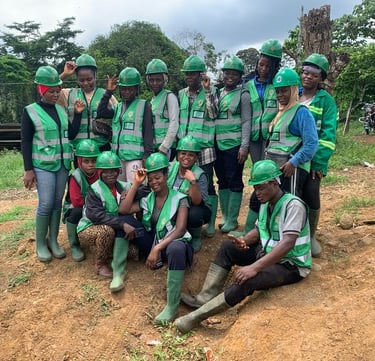 a group of people in green vests and safety vests