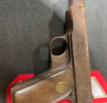 a corroded and rusty firearm 