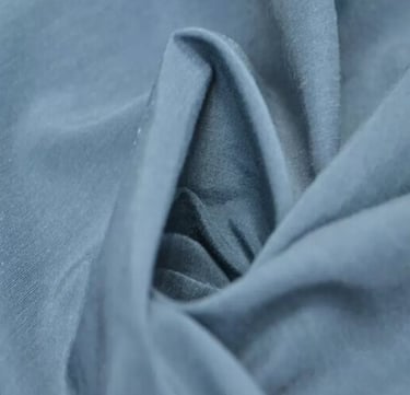 a close up of a blue fabric covered fabric