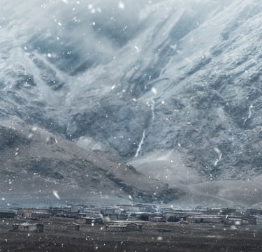 a train traveling through a snowy mountain range