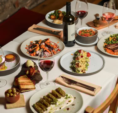 Gourmet New Armenian Cuisine dinner spread.