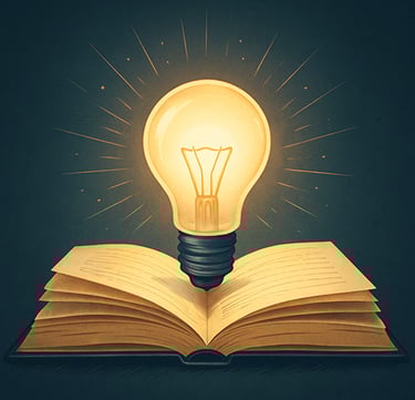 Ampoule allumée dans un livre : ne jamais cesser de poser des questions