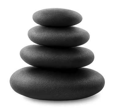 Stack of smooth black volcanic stones for hot stone massage therapy.