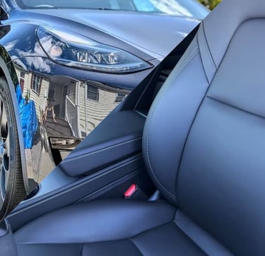 Interior and Exterior of a grey tesla mobile y