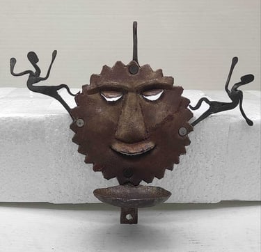 "Handcrafted iron oil lamp with sun face and two tribal figures-for export markets"