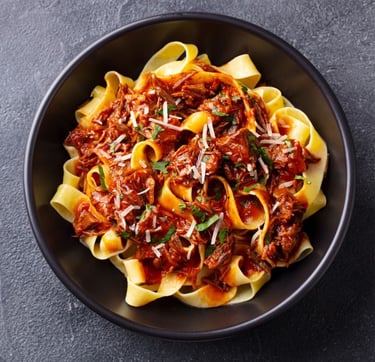 bolognese in black bowl