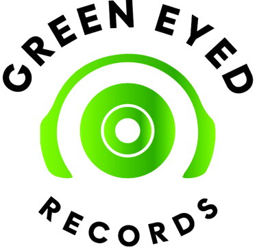 a green eyed record player's headphones and headphones