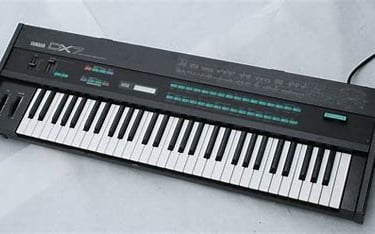 Yamaha DX7: 6 operator digital FM synthesizer.