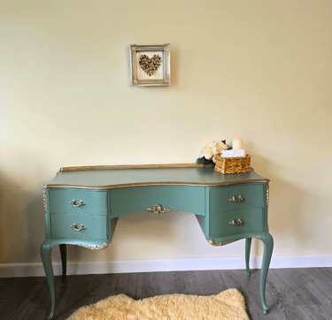 A painted french style dressing table painted in Farrow and Ball - Green Smoke with gold highlights