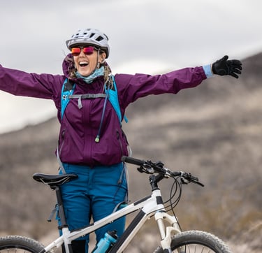 Woman mountain biking in Colorado