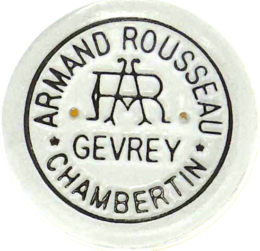 Bottle capsule of the Domaine Armand Rousseau Chambertin accounts seen from above