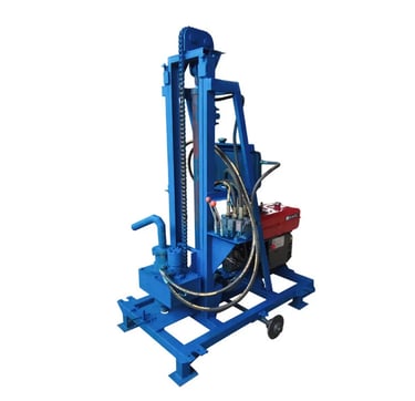 Portable hydraulic water well drilling rig with a blue steel frame and diesel engine.