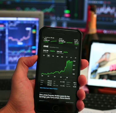 phone showing investing chart symbolizing market volatility