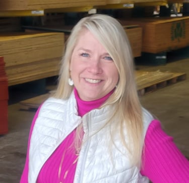 Female bookkeeper for contractors in lumber warehouse