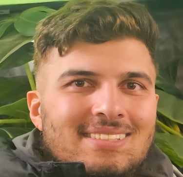 a man with a green umbrella in a green field