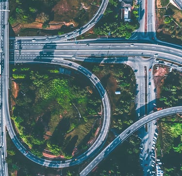 Aerial view of highway interchange with greenery