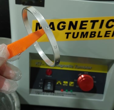 Close-up of silver surface finishing showing refined texture and detail.