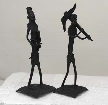 "Handmade iron sculpture of tribal farmer with plough, wife holding child-for worldwide trade"