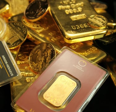 gold bars and coins representing long term potential of gold ira for retirement