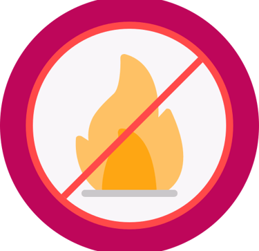 Red circle with a diagonal line over a fire flame representing a no fire or fire prevention sign.