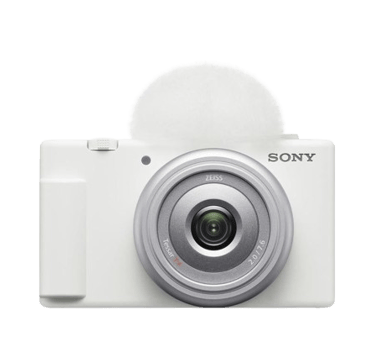 White Sony ZV-1F vlog camera with a Zeiss lens and white wind screen on a black background.