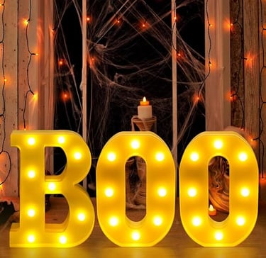 White LED marquee letters spelling "BOO" with glitter finish, perfect Halloween decoration for home,