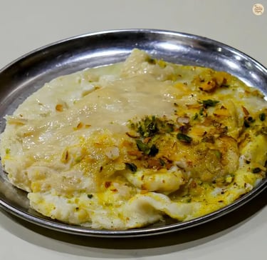 Traditional Malai Roti served at Vijay Restaurant in Jodhpur, a famous Rajasthani sweet delicacy.