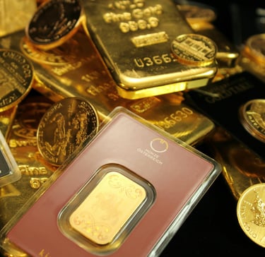 gold bars and coins representing long term potential of gold ira for retirement