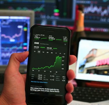 phone showing investing chart symbolizing market volatility
