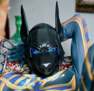 Man in hero costume, posing in a pup mask.