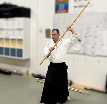 Mark practicing bojutsu