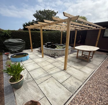 round raised pond paving & pergola garden ponds
