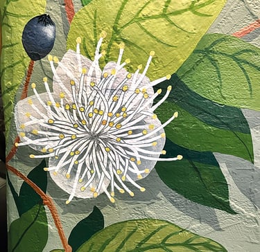 Gros plan sur une peinture murale acrylique lessivable représentant une fleur de myrte