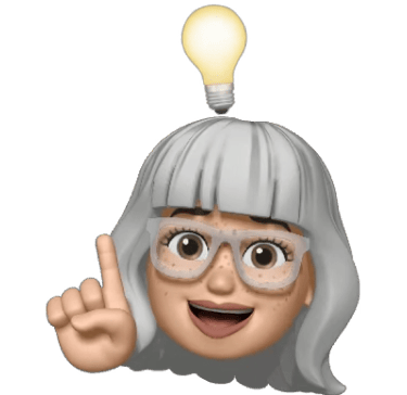 A smiling grey-haired female Memoji character with glasses having a bright idea with a glowing lightbulb.