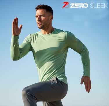 a man in a green full sleeves t-shirt is running on a road