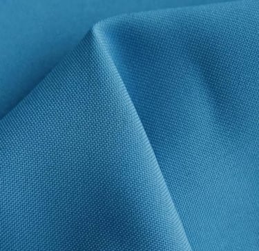 a blue fabric with a white background