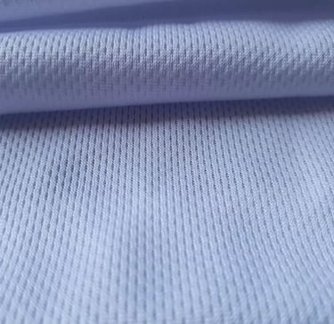 a close up of a blue and white shirt