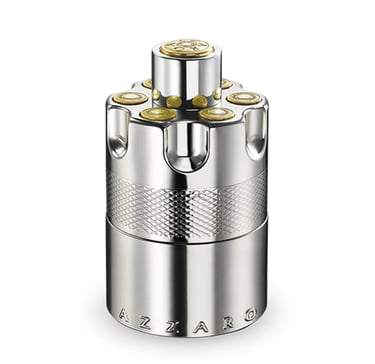 Azzaro Wanted cologne in a silver revolver cylinder-shaped bottle with brass accents.